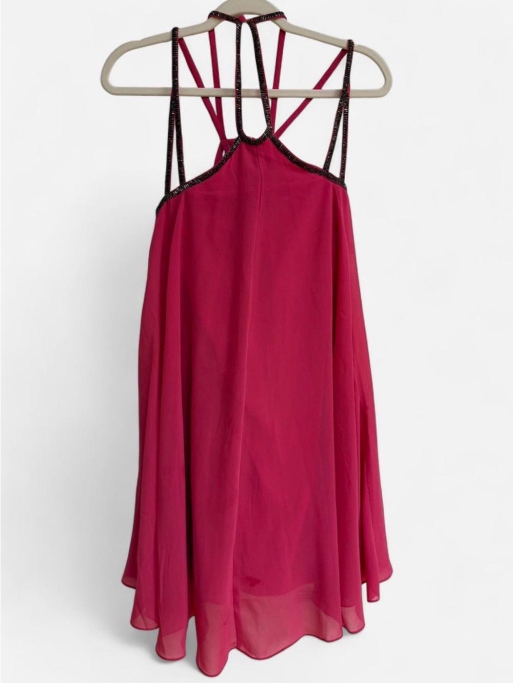 Sleeveless Ruffled Hem Spaghetti Strap Top in Magenta